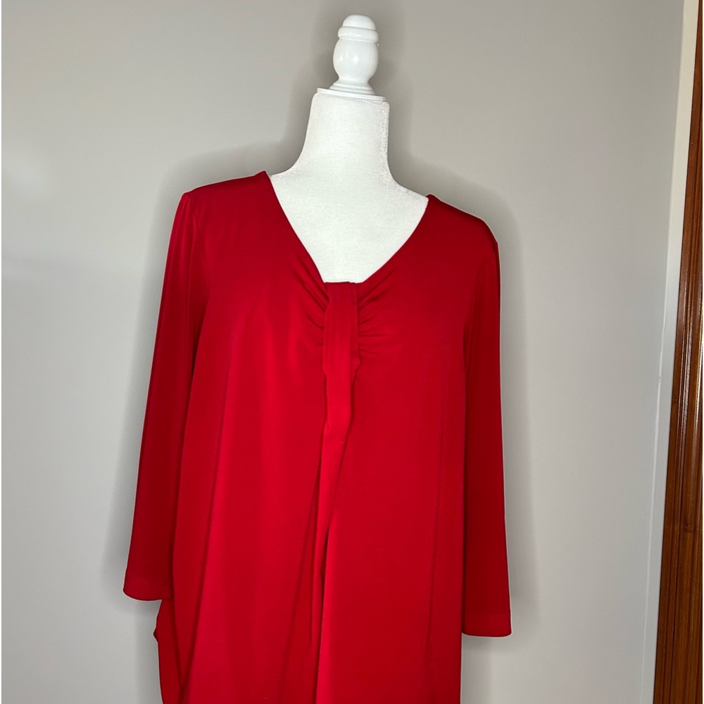 Chico size 3 or extra-large red V-neck top with accent down the front